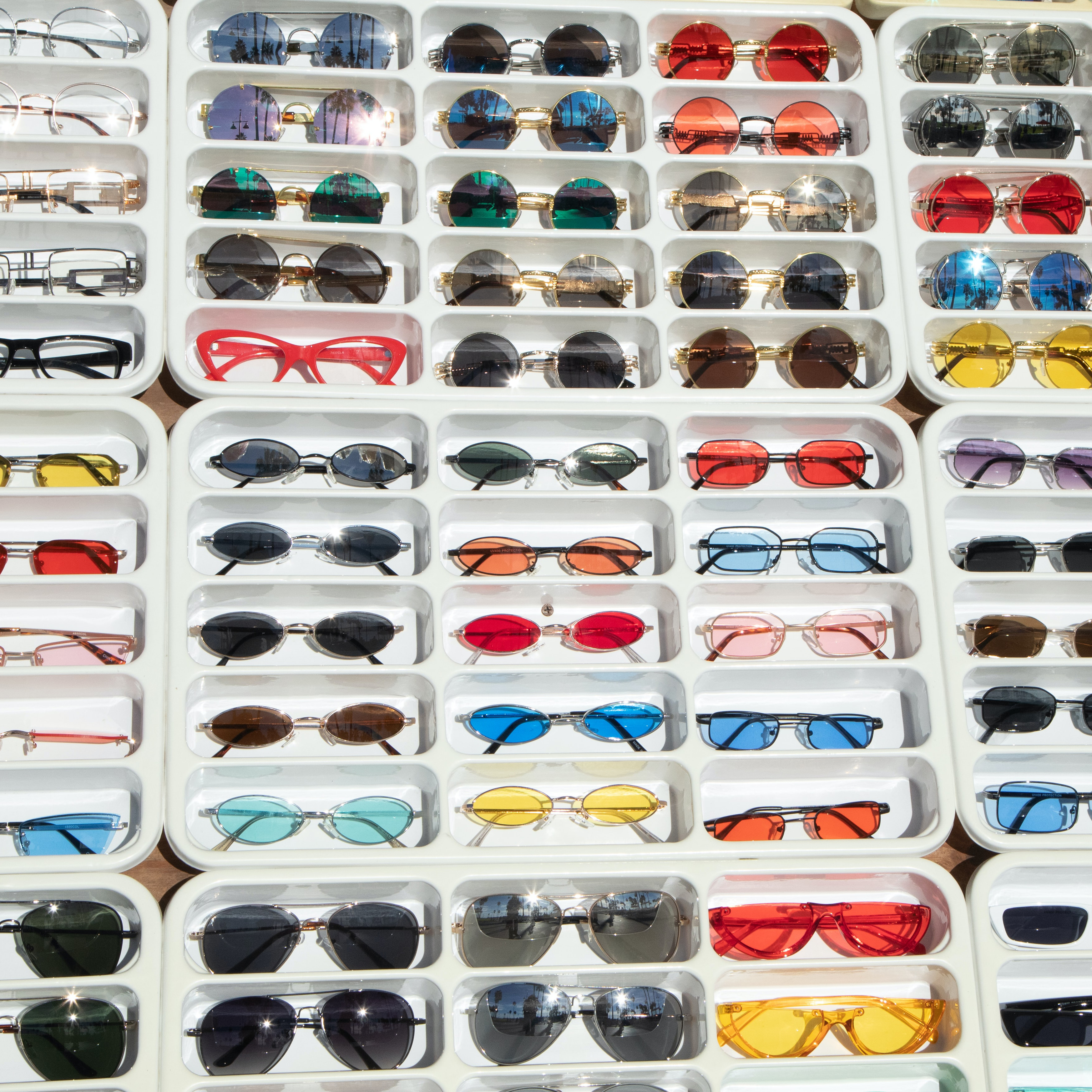 selection of sunglasses on shelves